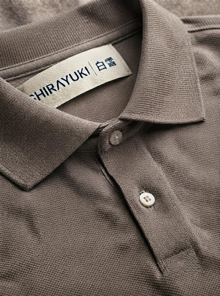 Kaze knit polo collar and Shirayuki neck label, close-up